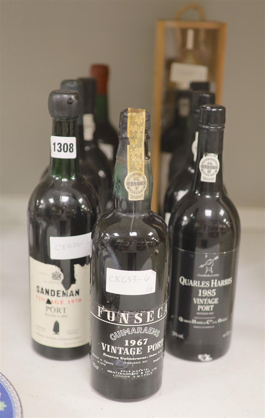 Nine assorted bottles of Port.